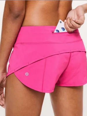 Lululemon Speed Up Shorts in the bright Sonic Pink colorway thumbnail 1