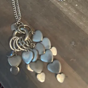 Long gold tone tiered hearts tassel necklace thumbnail 4