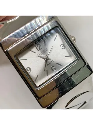 Studio silver tone women’s watch 24mm quartz cuff bracelet size 6.5” running thumbnail 2