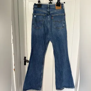 Levi’s 70’s High Flare Manufactured Distressed blue denim jeans size 27 thumbnail 3