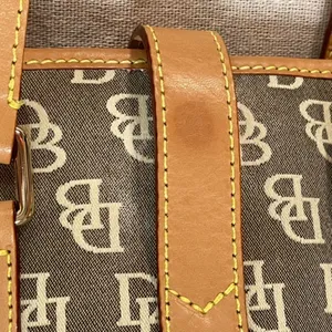 Dooney & Bourke | Vintage Tan and Gray Signature Classic Bucket Bag thumbnail 15