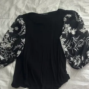Women’s Black Top with White Floral Sleeves thumbnail 1