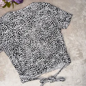 Brandy Melville Black and White Dotted Wrap Top thumbnail 8