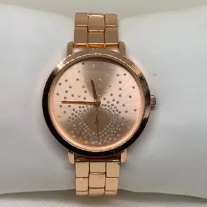 Rose gold tone women’s quartz analog wrist watch 38mm heart dial running thumbnail 1