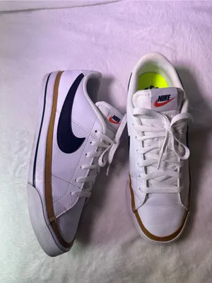 Nike White Sneakers with Black Swoosh and Orange Accent thumbnail 5