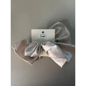 Francesca's Ivory Satin Oversized Bow Scrunchie Floral Embossed Hair Accessory thumbnail 3