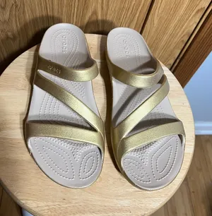 CROCS Women’s Metallic Gold Multi-Strap Slide Sandals thumbnail 1