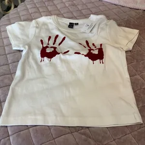 Windsor White Short-Sleeve Tee with Red Handprint Graphic thumbnail 1