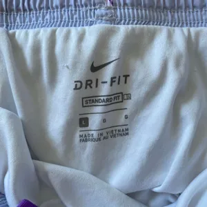 Nike Dri-Fit Running Shorts L Purple Swoosh Print Lightweight Activewear thumbnail 3