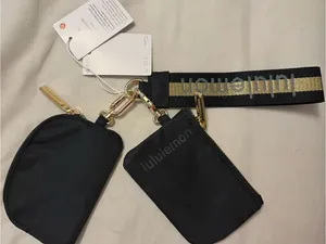 ✨Lululemon Dual Pouch Wristlet Black / Gold / Grey✨ thumbnail 9
