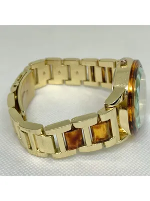 Gold tone tortoiseshell style women watch 38mm quartz analog up to 7.5” running thumbnail 8