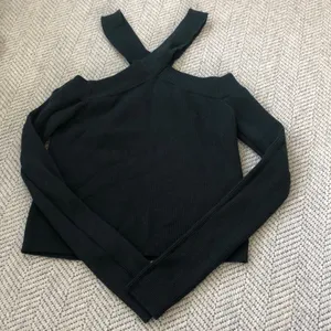 Lulu's Black Crisscross Cold-Shoulder Ribbed Sweater thumbnail 1