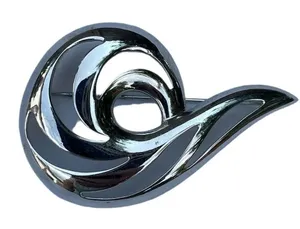 Vintage shiny Monet swirl brooch. Large thumbnail 1