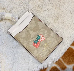 Id Lanyard In Signature Canvas With Strawberry Print coach 93727 thumbnail 3