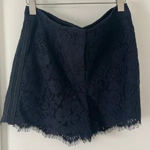 Ann Taylor navy lace shorts with pockets in size 6 thumbnail 1