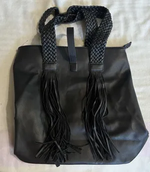 Lionel Handbag Fringe Braided Handles Zip Close Logo Large Compartment‎ thumbnail 1