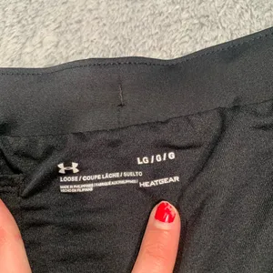 Under Armour Women's Black and White Athletic Shorts thumbnail 6
