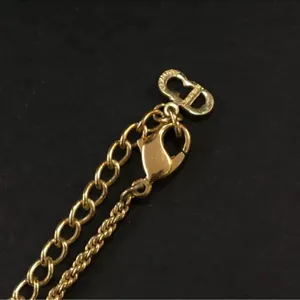Christian Dior gold perfume bottle necklace with Dior logo thumbnail 4