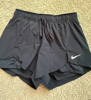 Nike Women's Black Layered Athletic Shorts with White Swoosh thumbnail 1