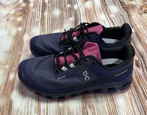 On | Cloudvista Waterproof Trail Running Shoe (Women) |10 Waterproof: protects against rain, puddles and slush to keep feet dry in wet conditions Trail: provides superior stability and traction on hills, uneven surfaces and changing terrain Lightweight: puts cushioning and performance underfoot with an emphasis on streamlined comfort Removable, cushioned insole allows for custom orthotics Helion™ superfoam cushioning delivers lightweight energy return even in hot and cold temperatures CloudTec® sole provides a smooth ride that moves naturally with each stride Missiongrip™ multidirectional lugs in the tread maintain superior grip on changing terrain Synthetic and textile upper/textile lining/rubber sole thumbnail 3