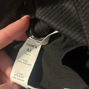 Halara High Waisted Invisible Zipper 2-in-1 A Line Mini Corduroy Black Skirt Med thumbnail 6