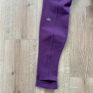 Alo Yoga Airlift Suit Up Stirrup Leggings in a gorgeous plum purple shade thumbnail 7