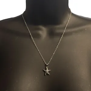 Silver tone starfish pendant necklace thumbnail 1