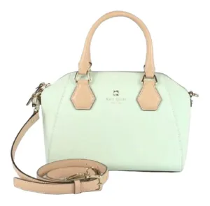 Kate Spade NEW YORK-MINT MOJITO PIPPA PARNELL STREET LEATHER SATCHEL Perfect spring bag, mint green white tan handle and crossbody strap, top zip closure, stripe print interior, inside zip pocket, inside two open pockets, amazing condition, there are two call outs, a small smudge on the bottom of the bag and a small smudge on one corner, please see the last two pictures **This bag is preowned and is being sold as is** thumbnail 2