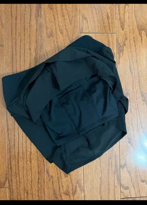 Black Athletic Flowy Activewear Workout Shorts - Size Medium. Gently warn and excellent condition. Under shorts with pockets. Measurements approximately 14” waste, not fully stretched out x 13.5” long. Non-smoking home. priced to sell at as is condition. Don’t like my price, make reasonable offer! And thank you for checking my closet. thumbnail 3