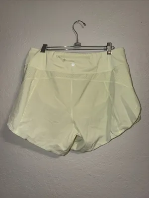 Athleta run with it shorts pastel lime green thumbnail 2