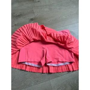 EUC Women Lululemon Pleat To Street Skirt II Grapefruit neon tennis skirt Size 8 thumbnail 4
