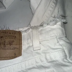 Vintage Levis 912 Slim Fit Tapered Leg Jeans White Orange Tab 11 Short Raw Waist thumbnail 8