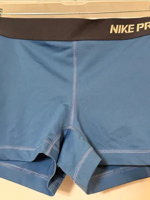 Nike Blue Compression Shorts with Black Waistband and Yellow Swoosh thumbnail 4