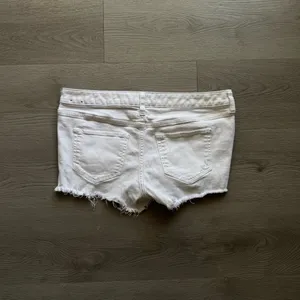 Express Low Rise Cut Off Denim Shorts thumbnail 5