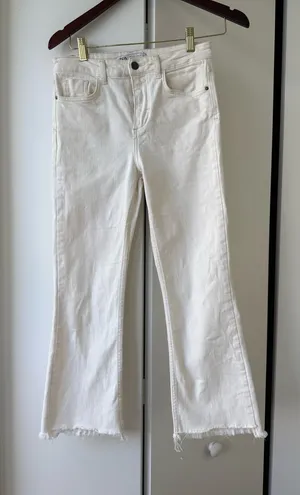 Zara white cropped flare jeans with a raw, frayed edge hemline thumbnail 1
