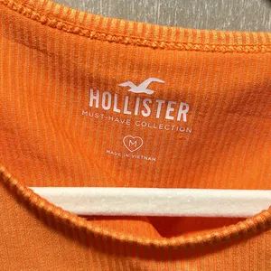 Bright orange hollister cutout shoulder crop tank top thumbnail 3