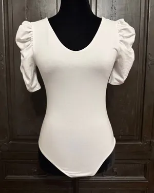 Vylette White bodysuit with Puffy Sleeves - Size Medium. ***refer to measurements. Super Cute top gentle worn and in excellent condition. Cotton/ spandex material. Measurements approximately for the bodysuit/ 14” from armpit to armpit x 25” from shoulder to snaps in crotch. Non-smoking home. Priced to sell at as is condition. Don’t like my price please make reasonable offer. thumbnail 1