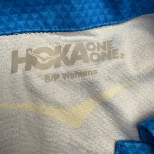Hoka‎ One One Womens Blue Athletic Golf Polo Shirt Short Sleeve Size S P thumbnail 3