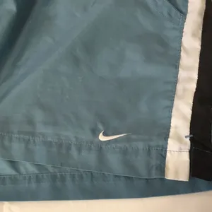 Nike • Turquoise Blue Pin stripe Runnings Shorts with Pockets Size Small thumbnail 2