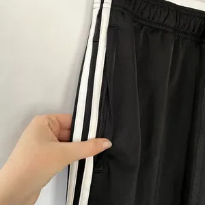 Adidas black and white casual athletic pants‎ zipper pocket women's size medium thumbnail 3