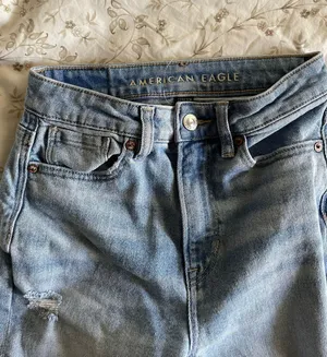 American Eagle Ripped Light Wash Mom Jeans thumbnail 3