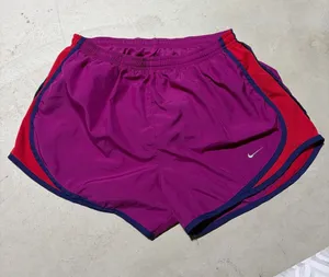 Nike Women's Magenta Running Shorts with Red Side Panels medium thumbnail 1