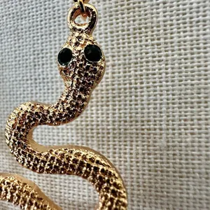 Gold Tone Snake Dangle Earrings with Black Eyes thumbnail 4