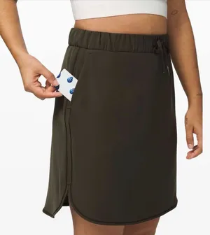 Lululemon On The Fly Skirt in Dark Olive thumbnail 1