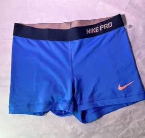 Nike Pro Royal Blue Athletic Shorts with Pink Swoosh thumbnail 1