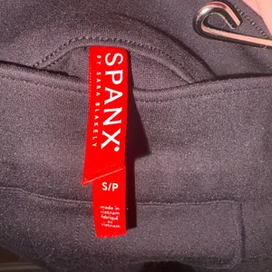 Spanx SPANXsupersmooth PerfectFit Ponte Flare Pants in Black thumbnail 4