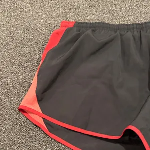 Nike Women's Athletic Shorts in Black and Red thumbnail 3