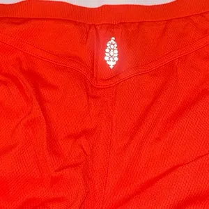 NWOT Free People Movement Prep In Your Step Shorts Orange White Small thumbnail 4