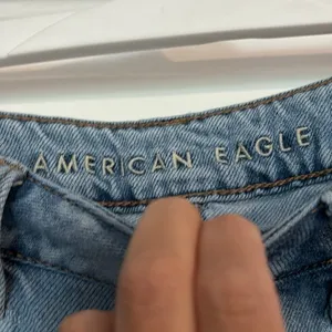 American Eagle Outfitters Hi Rise Tomgirl Distressed Jean thumbnail 2