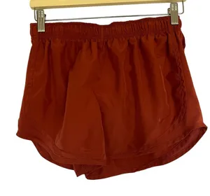 Nike‎ dri-fit coral rust red athleisure shorts elastic waist women's size medium thumbnail 1
